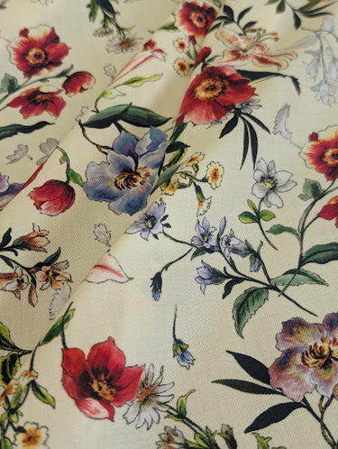 Floral pattern with colorful flowers on a cream background