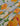 Floral fabric with yellow and white flowers on a polka dot background