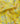Yellow Liberty Fabrics floral print fabric with delicate watercolor-style flowers and leaves in pink, blue, green, and peach tones, shown with soft folds.