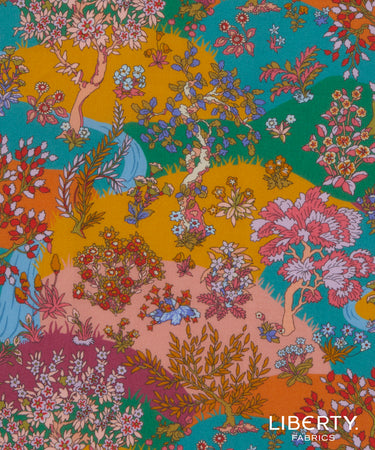 A close-up of a colorful Liberty Fabrics floral and botanical pattern with stylized trees, flowers, leaves, and small figures on a bright multicolor background. The Liberty Fabrics logo appears in the bottom right corner.