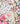 Colorful floral pattern on a black background with Liberty Fabrics branding.