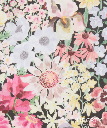 Colorful floral pattern on a black background with Liberty Fabrics branding.