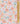 Liberty Fabrics floral patterned fabric with peach poppies, white daisies, and yellow flowers on a light blue background, shown with a gold metal ruler for scale.