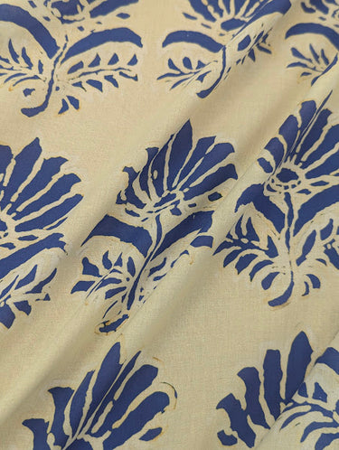 Ivory fabric with blue floral motifs