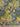 Floral fabric pattern with blue, yellow, and green colors on a Liberty of London label.