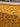 Bolt of floral fabric with pink and blue flowers on an orange background