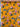 Floral fabric with pink and blue flowers on an orange background, and the brand 'Carnet' shown on the selvedge