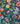Colorful floral pattern on a dark blue background with Liberty Fabrics branding.