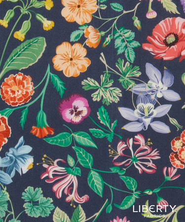 Colorful floral pattern on a dark blue background with Liberty Fabrics branding.