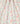 A close-up of draped fabric with a delicate, multicolor floral print on a cream background. The pattern features pink, red, yellow, and light blue flowers with green leaves and stems.