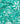 A close-up of a teal green fabric with a white floral line-art pattern, showing soft folds and a visible Liberty Fabrics logo in the bottom right corner.