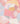 A close-up of Liberty Fabrics' abstract geometric patterned fabric, featuring overlapping shapes in soft pink, peach, yellow, light blue, and cream. 