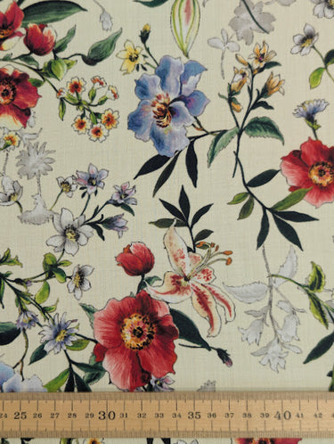 Floral fabric pattern with a ruler at the bottom for scale.