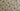 Floral patterned fabric with red, blue, and pink flowers on a cream background