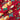 Close-up of a printed wool fabric with yellow flowers on a red background