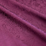 Close-up of purple fabric with floral pattern