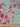 Floral fabric pattern with a ruler at the bottom for scale on a pastel background