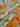 Floral fabric with yellow and white flowers on a polka dot background