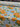Floral fabric with yellow and white flowers on a blue background