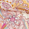 A close-up of a patterned fabric featuring a retro floral and paisley design in pink, orange, yellow, and white, with a Liberty Fabrics logo in the bottom right corner.