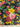 Floral fabric pattern with colorful flowers on a black background, featuring the brand 'Liberty'.