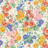 A close-up of Liberty Fabrics floral pattern featuring pink, orange, yellow, and blue flowers with green leaves on a white background.