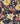 A close-up of Liberty Fabrics floral pattern featuring yellow magnolia flowers, coral pink blossoms, and cream leaves on a dark navy background.