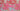 Large abstract floral pattern with pink, red and blue colours on a textured background