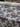 Floral fabric with purple and grey pattern on a light blue background
