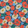 Floral pattern with red poppies, white daisies, and blue flowers on a navy background, featuring the Liberty Fabrics logo.