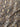 Close-up of a silk-blend cotton batiste fabric with a snake skin pattern