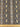 A silk-blend cotton batiste fabric with a snake skin pattern, shown with a ruler at the bottom for scale.