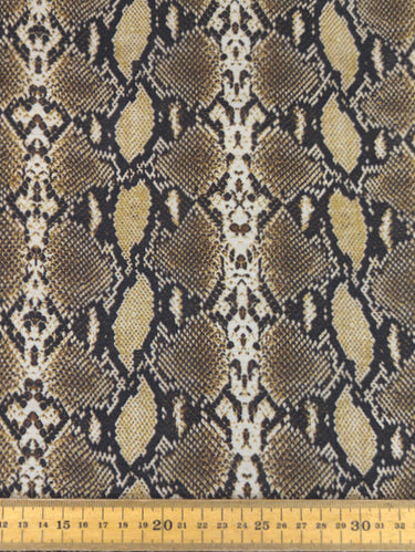 A silk-blend cotton batiste fabric with a snake skin pattern, shown with a ruler at the bottom for scale.