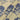 Ivory fabric with blue floral motifs