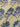 Ivory fabric with blue floral motifs