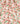 A close-up of a pleated fabric with an all-over floral print in shades of pink, red, orange, and green on a cream background. The Liberty Paris logo is visible in the bottom right corner.