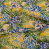Colorful floral fabric with blue, yellow, and green flowers.
