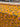 Bolt of floral fabric with pink and blue flowers on an orange background