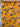Floral fabric with pink and blue flowers on an orange background, and the brand 'Carnet' shown on the selvedge 