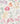 A close-up of a floral fabric pattern featuring pink, peach, purple, and yellow flowers with green leaves on a warm off-white background. The Liberty Fabrics logo is visible in the bottom right corner.