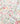 A close-up of a lightweight fabric with a delicate, multi-colored floral print on a warm cream background. The pattern features pink, red, purple, and blue flowers with green leaves.