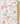 A close-up of a floral fabric pattern with pink flowers, green leaves, and soft botanical motifs on a light background, shown next to a gold ruler for scale. The brand name 'LIBERTY' appears in the bottom right corner.