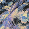 Close-up of pure wool fabric with abstract blue and lavender florals