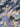 Close-up of pure wool fabric with abstract blue and lavender florals