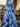 Pure wool floral fabric draped within a store setting