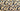 A printed pure wool fabric featuring yellow and white flowers on a dark blue background.